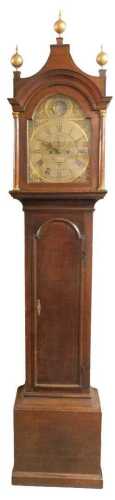 A Georgian oak longcase clock, by Robert Beets of Lynn, the break arch dial with floral and...