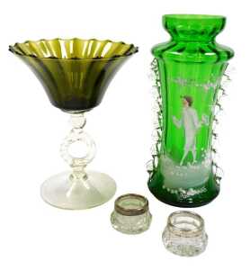 A late 19thC Mary Gregory style green glass vase, painted with a boy amongst trees, 28cm high, a...