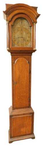 A Georgian oak longcase clock, by Peter Bowyer of London, the brass break arch dial with foliate...