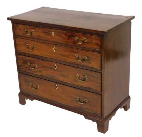 A George III mahogany bachelor's chest, with boxwood line inlay, of four long graduated drawers,...