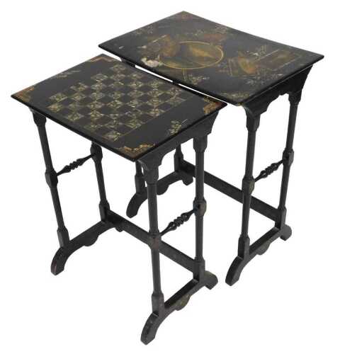 A Victorian papier mache nest of two occasional tables, the largest painted and mother of pearl...