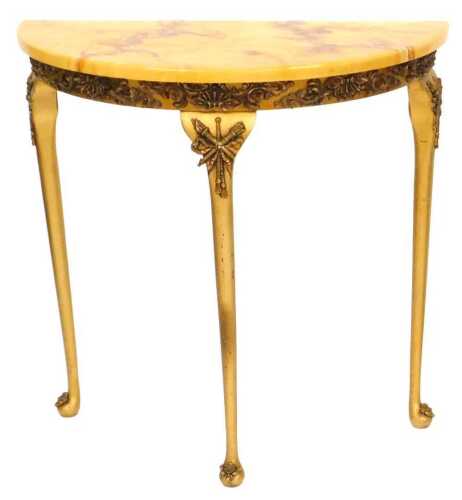 A late 20thC faux marble giltwood demi lune console table, with applied rococo scrolls, and bow...