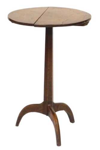 An early 19thC Georgian oak occasional table, the circular top raised on a hexagonal column and...