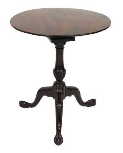 A George III mahogany birdcage tilt top occasional table, raised on a turned and spiral fluted...