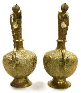 A pair of early 20thC Indian brass ewers, embossed with figures, animals, and scrolling leaves... - 3