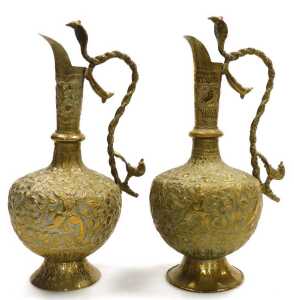 A pair of early 20thC Indian brass ewers, embossed with figures, animals, and scrolling leaves... - 4
