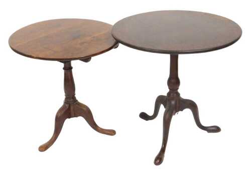 A George III mahogany tilt top occasional table, raised on a turned column over three cabriole...