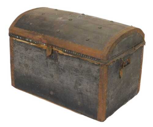 V - A Victorian leather bound domed trunk, the lid bearing studwork initials EC, 52cm high, 77cm...