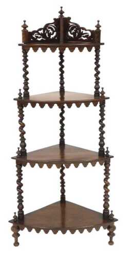 A Victorian mahogany four tier whatnot, raised on turned and barley twist supports. (AF)