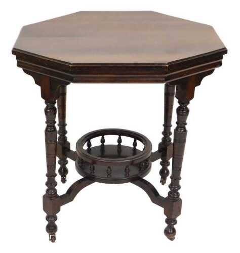 A Victorian mahogany window table, raised on turned legs united by a central circular galleried...