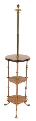 An early 20thC beech and copper floor standing lamp, with a beechwood top, raised on a copper...