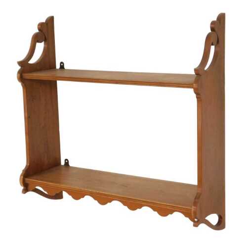 A Victorian style yew wood hanging bookcase, of two shelves, with a carved apron, 65cm high,...