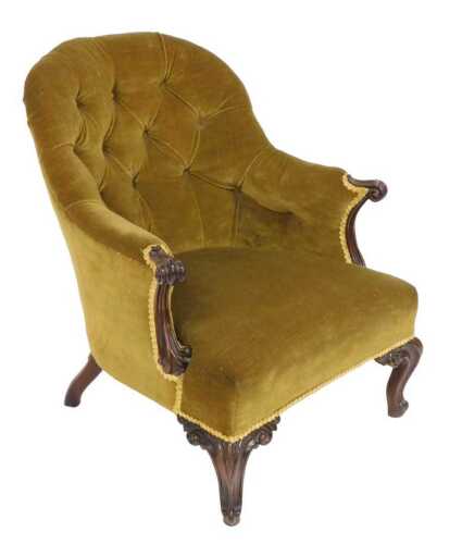 A Victorian mahogany nursing chair, upholstered in green button back draylon, raised on cabriole...