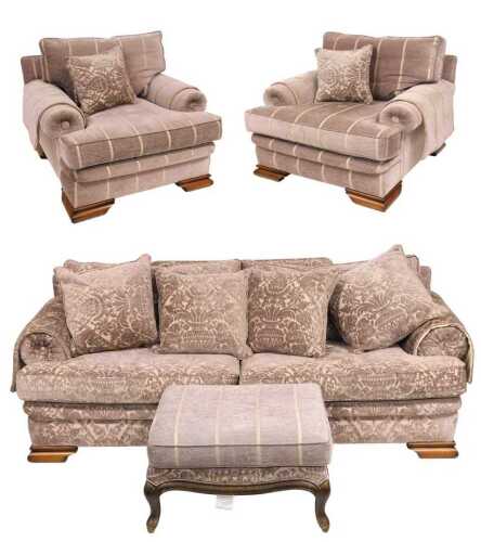 A four piece suite, upholstered in violet patterned or striped fabric, comprising a three seater...