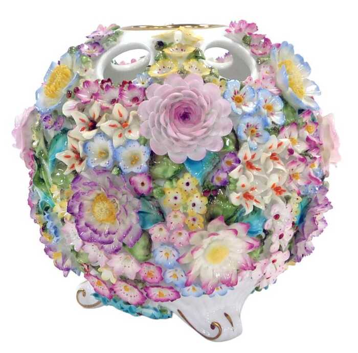 A Coalport Coalbrookdale porcelain flower encrusted vase, raised on three scroll feet, CC62,...