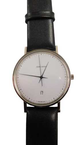 A Georg Jensen gentleman's wristwatch, designed by Henning Koppel, with a white dial and date...
