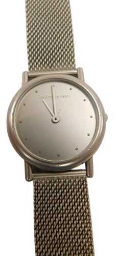 A Georg Jensen lady's wristwatch, designed by Thorup & Bonderup, with a metallic dial, in a...