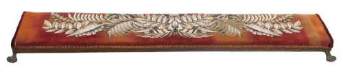 A Victorian mahogany wool and beadwork kneeler, decorated with ferns and leaves, raised on brass...