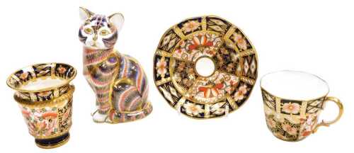 A Royal Crown Derby porcelain Imari cat paperweight, gold stopper, together with an Imari coffee...