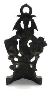 A Victorian cast iron door stop, modelled with a putto and vines, 42cm high. - 2