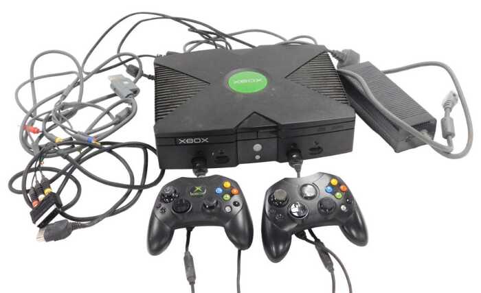An Xbox video game system, serial number 400645251705, with controller, adaptor, leads, etc.