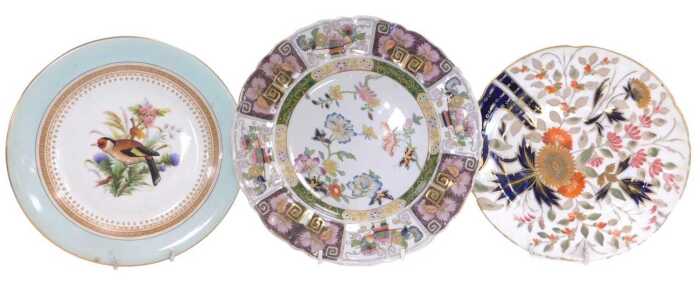 A late 19thC Royal Worcester porcelain plate, dated 1882, painted with a goldfinch and flowers,...