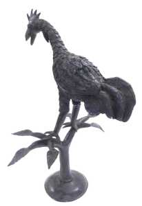 A cast iron figure of a cockerel, modelled perched on a divided tree trunk, and a circular base,... - 2