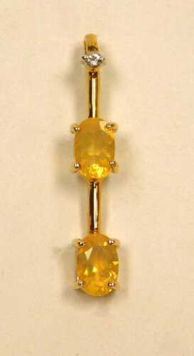 A 9ct gold Brazilian fire opal and white topaz pendant, for Gems TV, with certificate, boxed,...