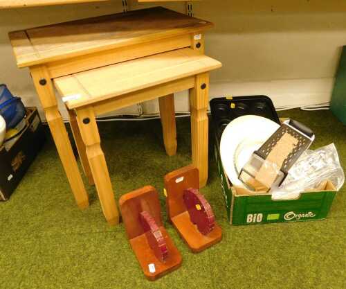 A nest of two tables, together with L shaped bookends decorated with hedgehogs, kitchenalia, etc....