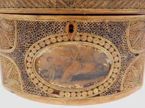 A George III navette shaped paper scroll tea caddy, the heavily carved lid with loop handle,... - 2