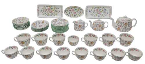 A Minton Haddon Hall part dinner service, to include teapot, 17cm high, another smaller,...