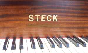 A Steck mahogany cased baby grand piano. - 4