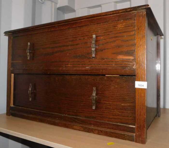 An oak chest, of two long drawers.