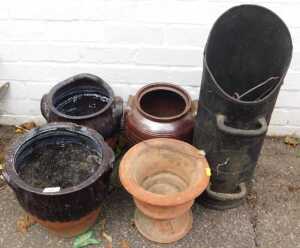 Three stoneware twin handled jars, each approx 27cm high, a terracotta urn, (AF), a paraffin...