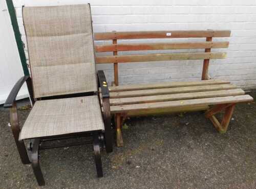 A wooden slatted garden bench, and a rocking garden chair. (2)
