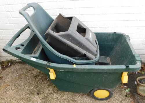 Two plastic wheelbarrows, etc.