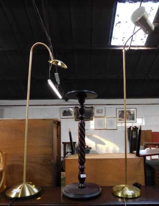 A stained pine plant stand, and two standard lamps. (3)