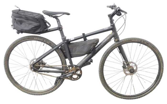 A Cannondale single speed hybrid bike, with a Lefty left pipe fork, Alvis disc brakes, and...