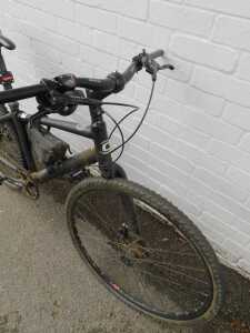 A Cannondale single speed hybrid bike, with a Lefty left pipe fork, Alvis disc brakes, and... - 2
