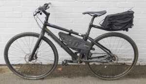 A Cannondale single speed hybrid bike, with a Lefty left pipe fork, Alvis disc brakes, and... - 5
