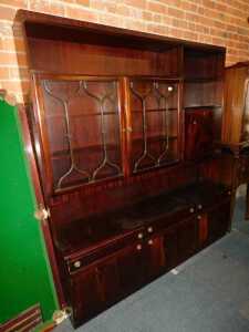 A mahogany veneered display cabinet, 193cm high, 180cm wide, 42cm deep.