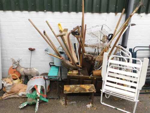 Assorted garden tools, four folding garden chairs, cushions lacking, fox and donkey garden...