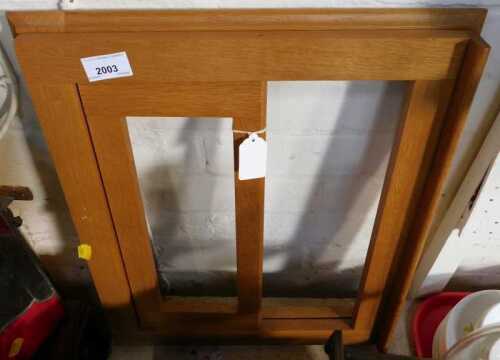 A light oak book stand.
