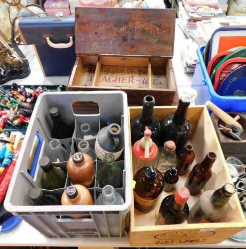 Miscellaneous bottles, a mahogany box with side handles, and a pine box.
