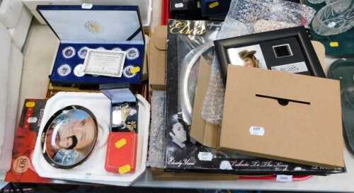 A quantity of Elvis Presley novelty items, to include framed film clock, set of medallions,...