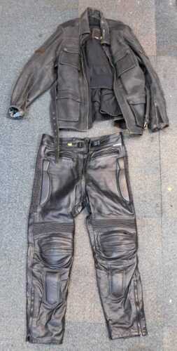 A leather motorcycle jacket and trousers, black finish with brown banding, FTL237 Club Classic,...