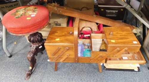 A 20thC silver topped piano stool, with a rose tapestry seat, a cantilever sewing box and...