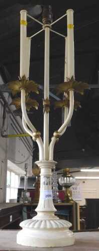 A Continental cream painted metal table lamp, with three branches joined by a central light...