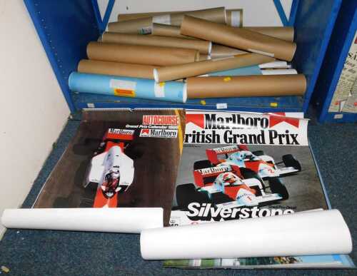 A group of motor racing, posters, prints, and calendars.