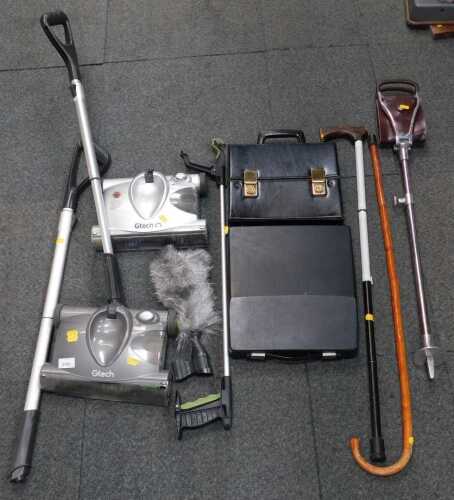 A G-Tech vacuum cleaner, hiking stick, record case, and a typewriter. (1 bay)